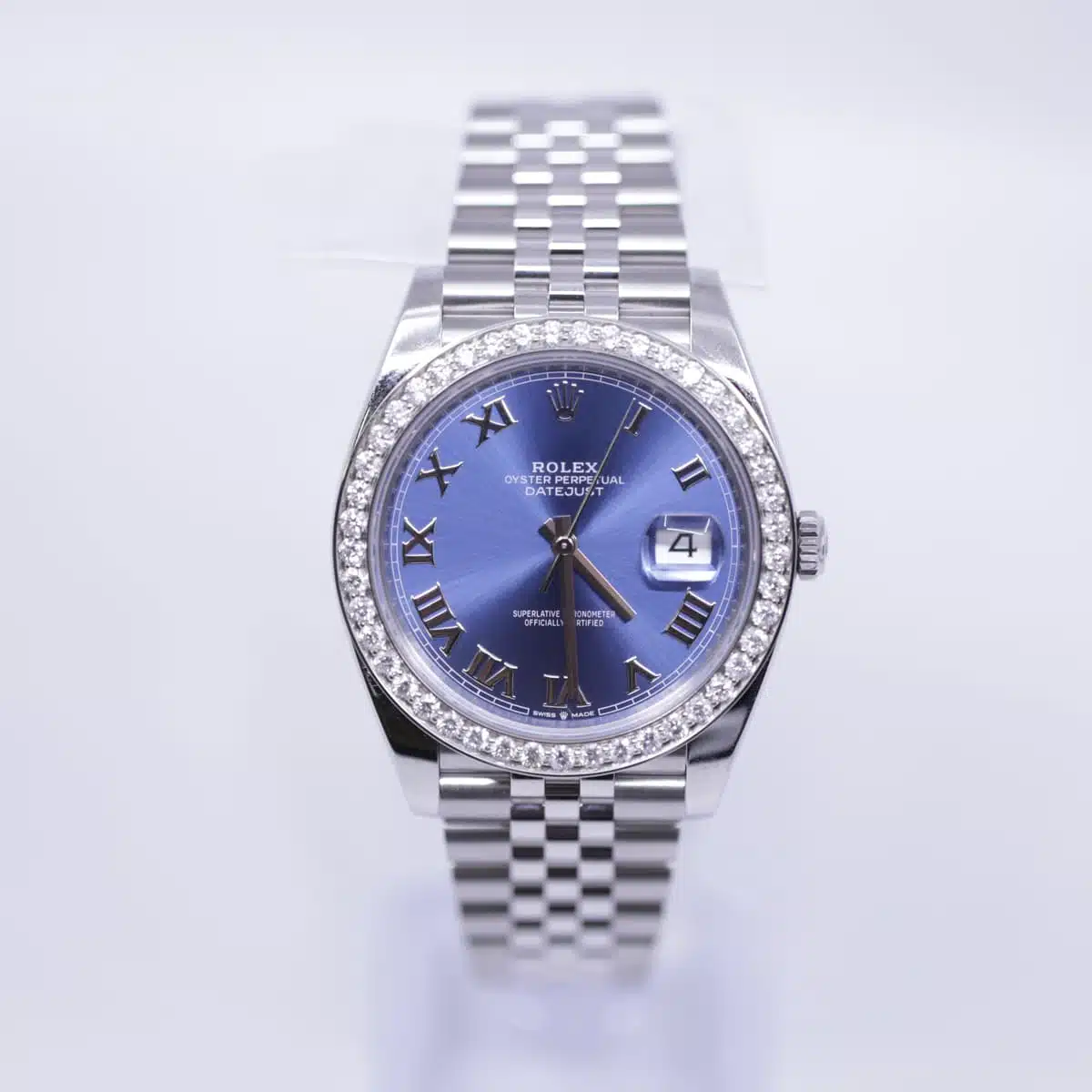 Rolex datejust blue discount dial diamond bezel